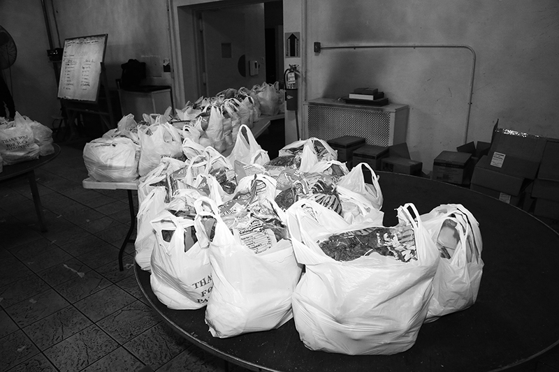 2020 : Food Lines : Seventh Day Adventists Help the Needy : Streetlife : New York City : Times Square : Richard Moore : Photographer : Photojournalist